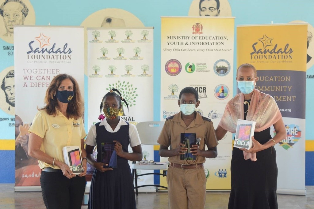 sandals foundation tablets hand over to ministry of education